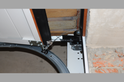 Garage Door With A Broken Spring – Open It Using An Automatic Operator